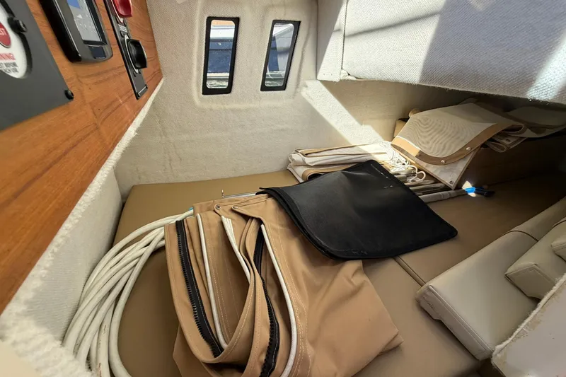 Slide: The Image of Interior cabin of 2023 Ranger Tugs R-25 with storage and equipment. - 39