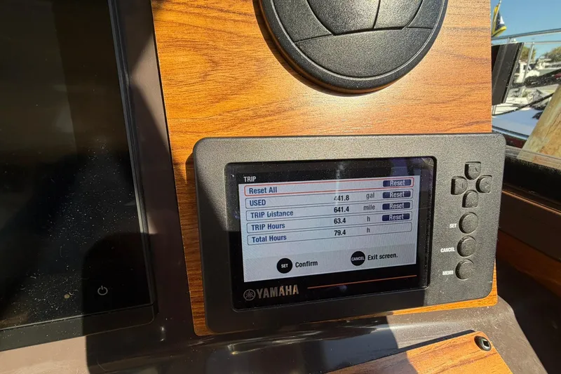 Slide: The Image of Yamaha display on 2023 Ranger Tugs R-25 showing trip data and settings. - 43
