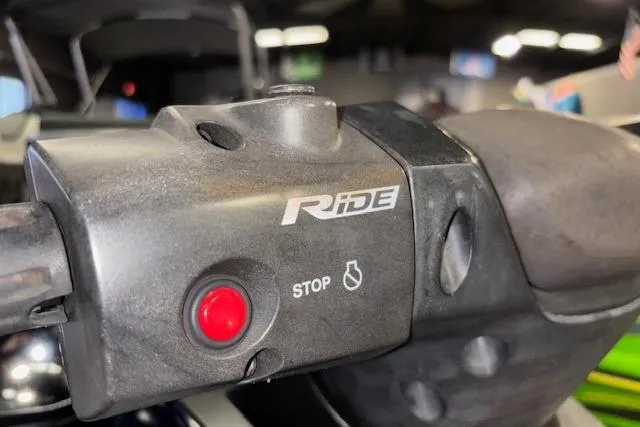 Slide: The Image of Close-up of 2017 Yamaha WaveRunner VX Deluxe handlebar with stop button and Ride control. - 13