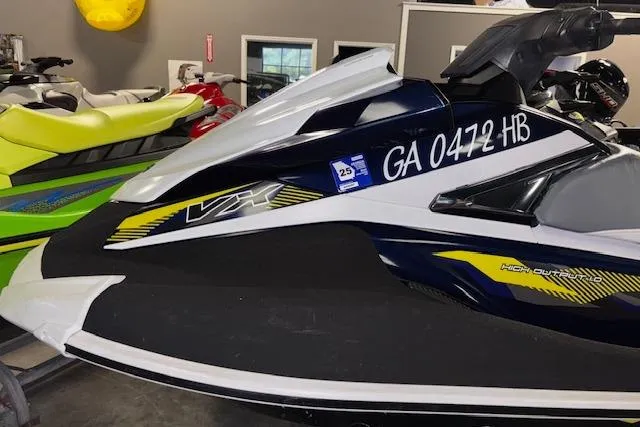 Slide: The Image of 2017 Yamaha WaveRunner VX Deluxe jet ski in a showroom, side view. - 4