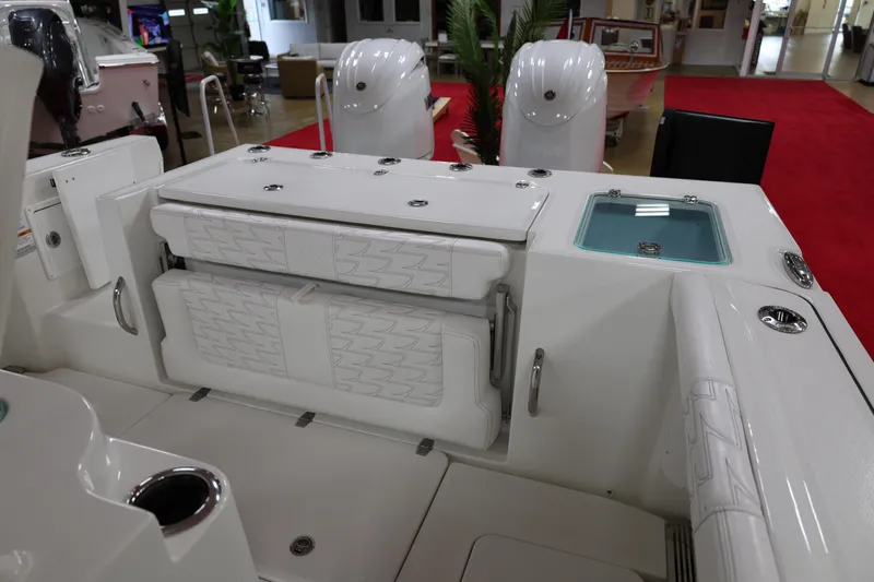 Slide: The Image of 2026 Parker 274 Fathom boat interior with seating and storage compartments. - 10