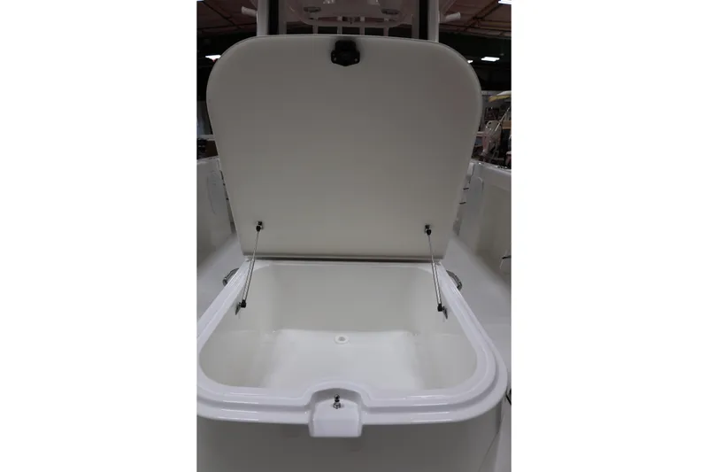 Slide: The Image of Open storage compartment on 2026 Parker 274 Fathom boat, showcasing interior space. - 19