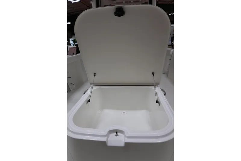 Slide: The Image of Open storage compartment on 2026 Parker 274 Fathom boat, showcasing interior space. - 20