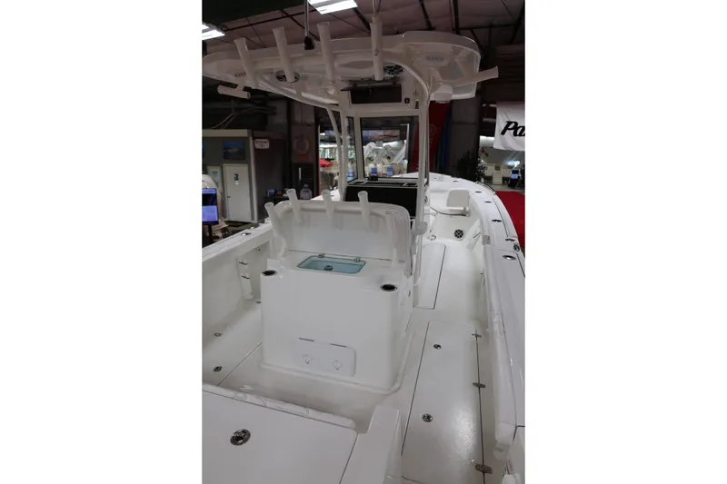 Slide: The Image of 2026 Parker 274 Fathom boat interior with seating and storage compartments. - 7