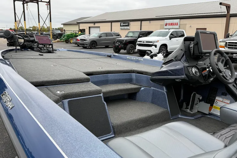 Slide: The Image of 2022 Skeeter ZXR21 boat interior with advanced navigation system and spacious seating. - 16