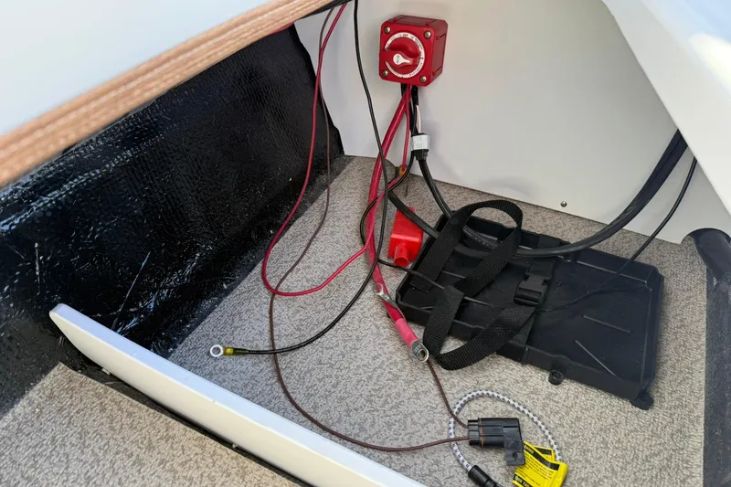 Slide: The Image of Interior wiring of 2026 Stingray 182 SC boat, featuring battery connections and switch. - 12