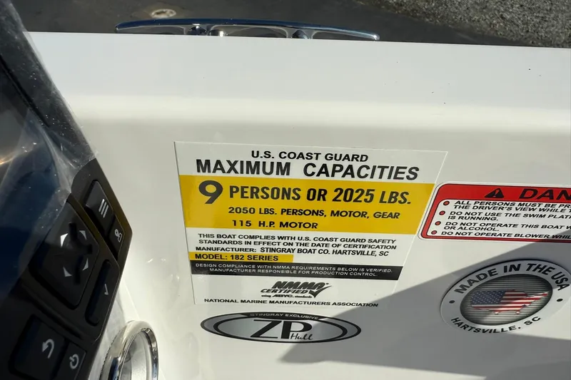 Slide: The Image of 2026 Stingray 182 SC boat capacity label, 9 persons or 2025 lbs, 115 HP motor. - 17