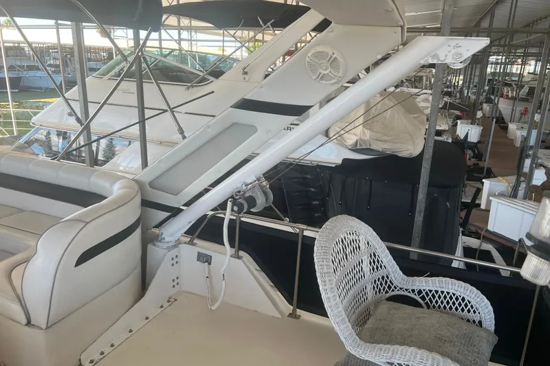 Slide: The Image of 1986 Bayliner 4550 Motoryacht Flybridge showing dinghy davit with reinforced base - 2