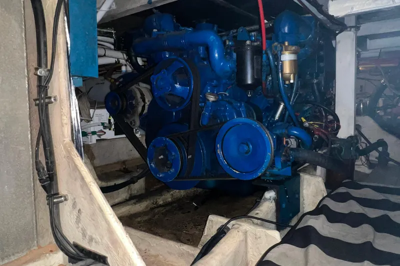 Slide: The Image of Engine room of 1986 Bayliner 4550 Motoryacht, showing starboard engine. - 26
