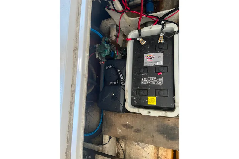 Slide: The Image of Starboard 8D engine starting battery(new) and generator starting battery (in case) - 30