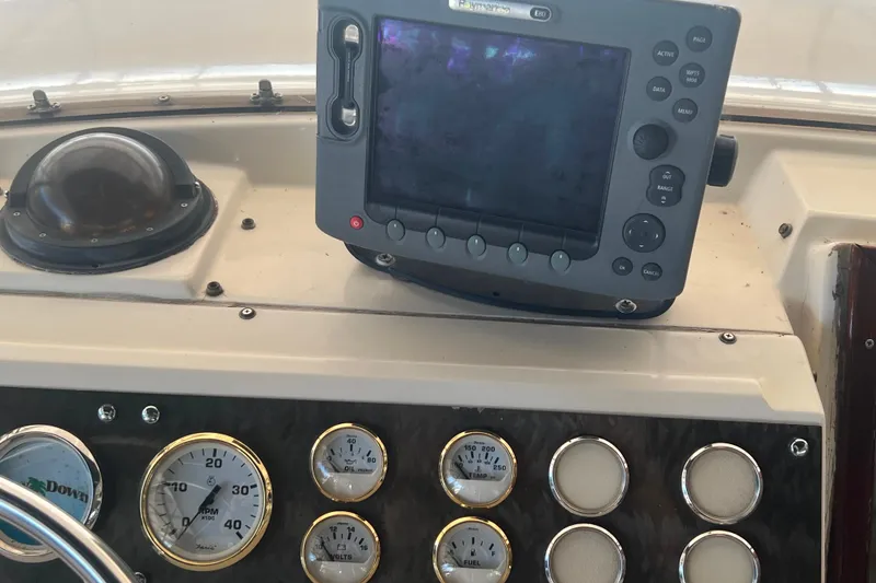 Slide: The Image of Dashboard of 1986 Bayliner 4550 Motoryacht with navigation equipment and gauges. - 7