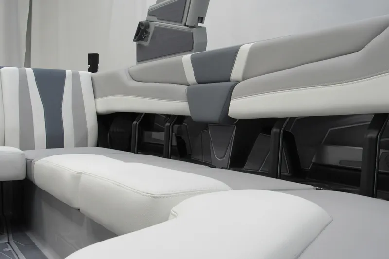 Slide: The Image of 2026 Malibu Wakesetter 21 LX interior seating, featuring modern gray and white upholstery design. - 10