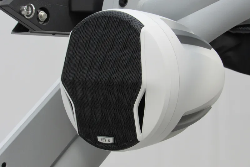 Slide: The Image of White and black REV 8 speaker on Malibu Wakesetter 21 LX, 2026 model. - 13