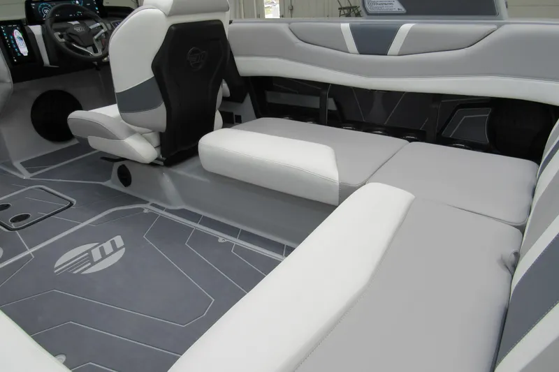 Slide: The Image of 2026 Malibu Wakesetter 21 LX interior with sleek seating and modern design. - 5