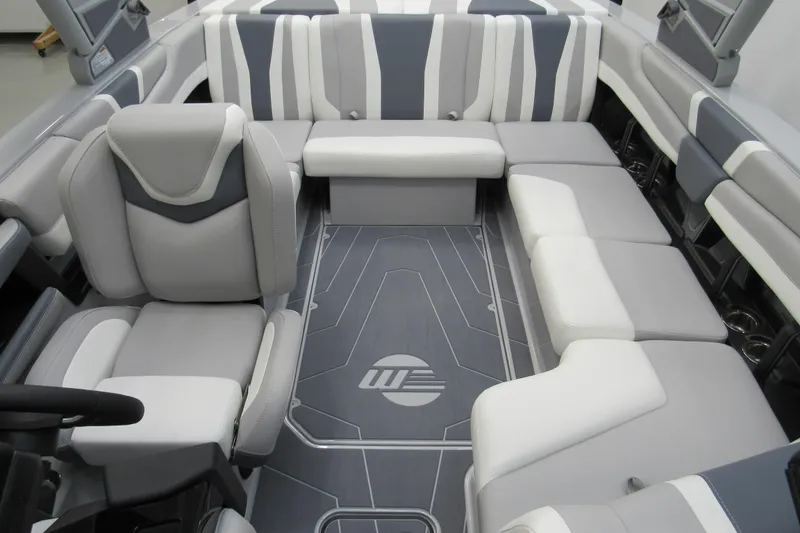 Slide: The Image of 2026 Malibu Wakesetter 21 LX interior with gray and white seating, modern design. - 9