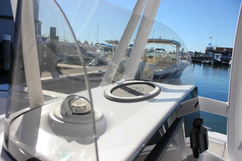 Slide: The Image of Open storage compartment on 2020 Sea Hunt Ultra 234 boat interior. - 21