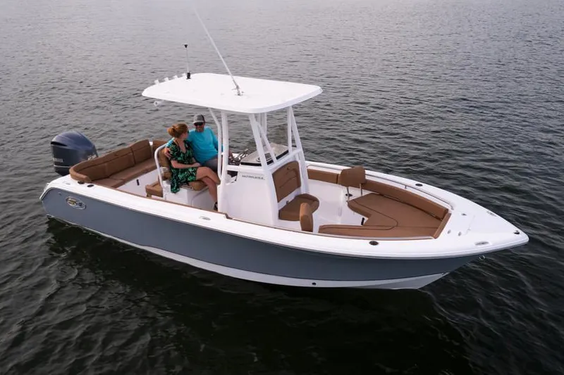 Slide: The Image of 2020 Sea Hunt Ultra 234 boat model nameplate on white surface. - 41