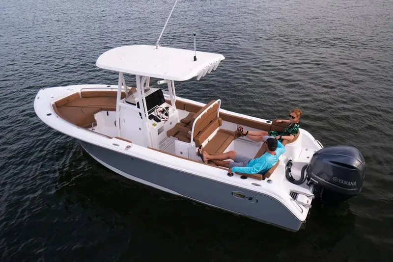 Slide: The Image of Control panel of 2020 Sea Hunt Ultra 234 with Garmin navigation and JL Audio system. - 42