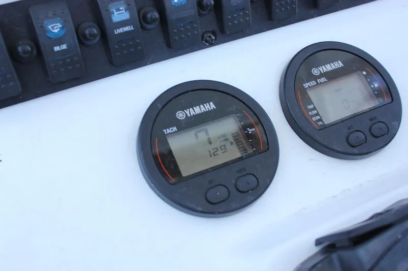 Slide: The Image of Dashboard of a 2020 Sea Hunt Ultra 234 boat with navigation display. - 7
