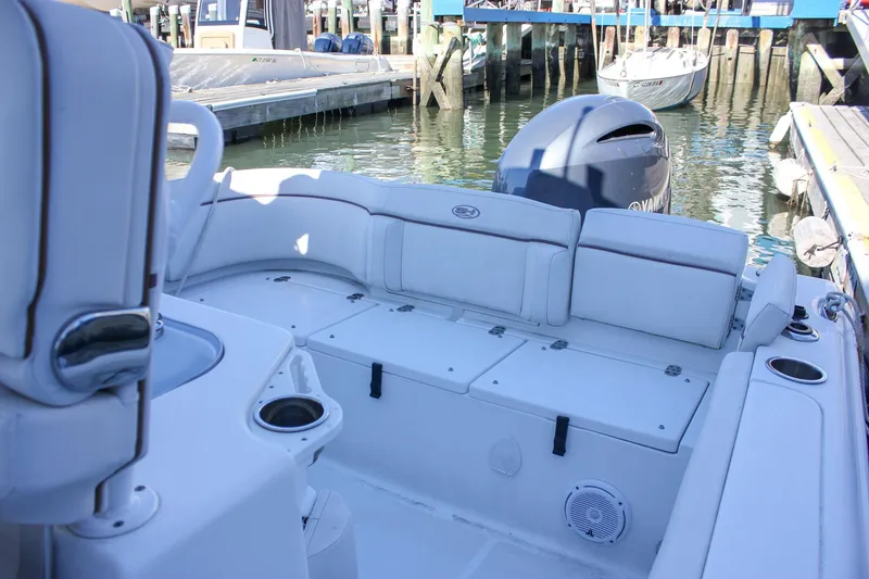 Slide: The Image of Yamaha gauges on 2020 Sea Hunt Ultra 234 boat dashboard, showing tachometer and speed/fuel indicators. - 8