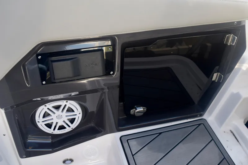 Slide: The Image of 2025 Monterey 275SS Super Sport boat interior with speaker and storage compartment. - 105
