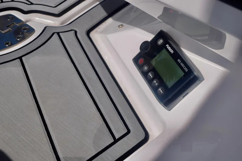 Slide: The Image of 2025 Monterey 275SS Super Sport boat with Fusion MS-NRX300 audio control panel. - 109