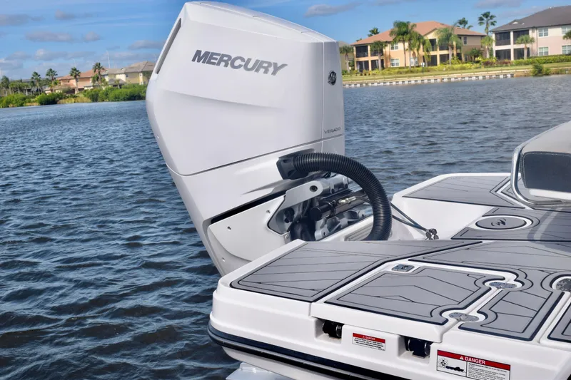 Slide: The Image of 2025 Monterey 275SS Super Sport boat with Mercury Verado engine on a lake. - 11