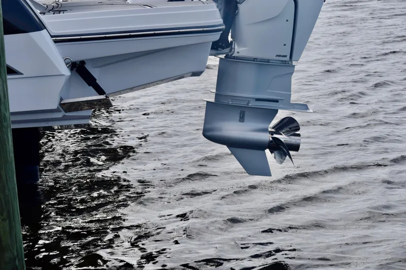 Slide: The Image of 2025 Monterey 275SS Super Sport boat engine over water. - 24