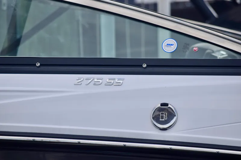 Slide: The Image of 2025 Monterey 275SS Super Sport boat side view with model emblem and fuel cap. - 29