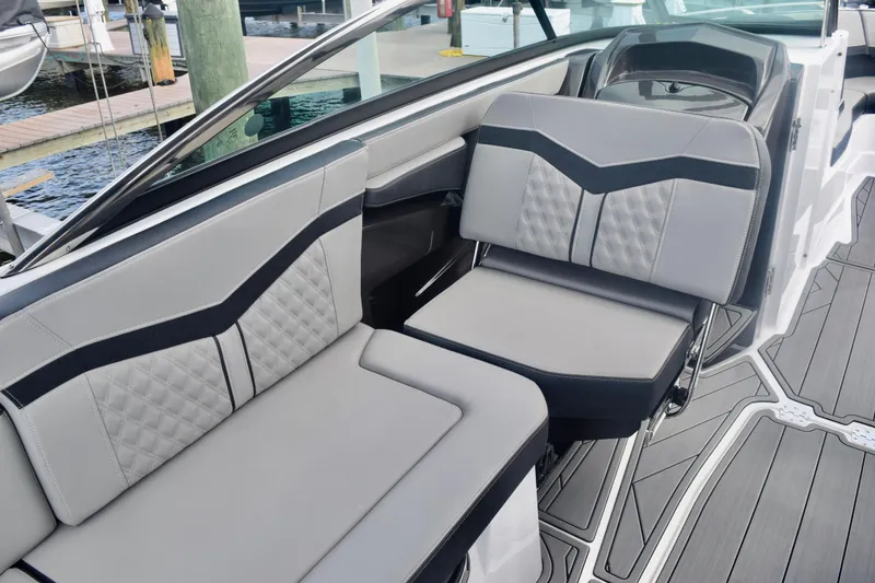 Slide: The Image of 2025 Monterey 275SS Super Sport boat interior with stylish seating and modern design. - 56