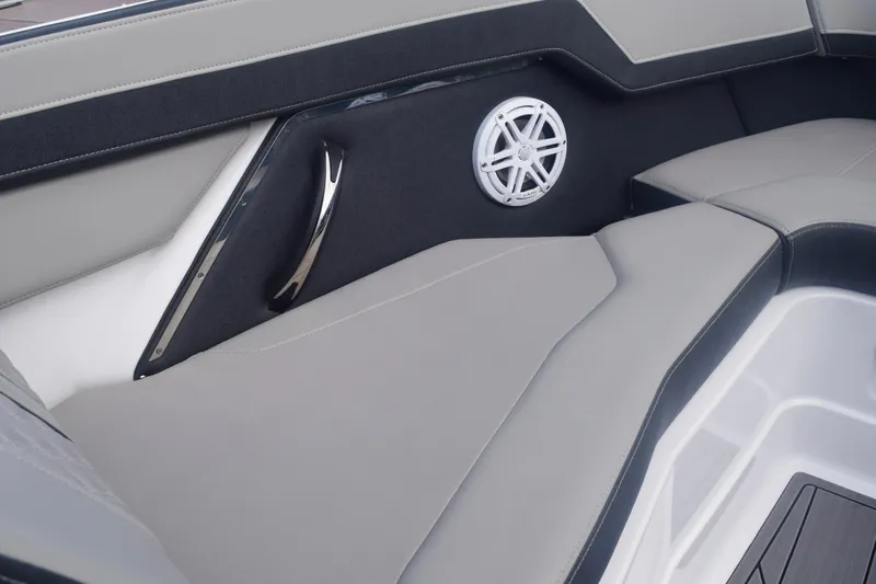 Slide: The Image of 2025 Monterey 275SS Super Sport interior with sleek seating and integrated speaker system. - 68