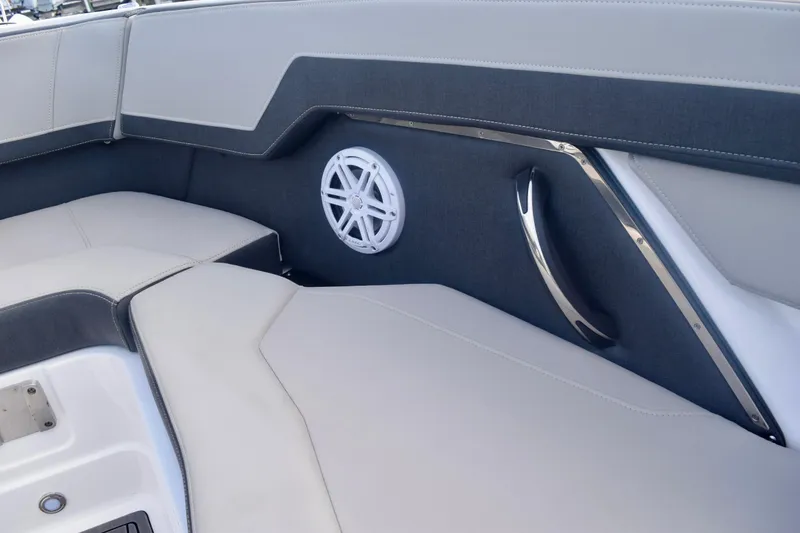 Slide: The Image of Interior of 2025 Monterey 275SS Super Sport boat with sleek seating and speaker. - 73