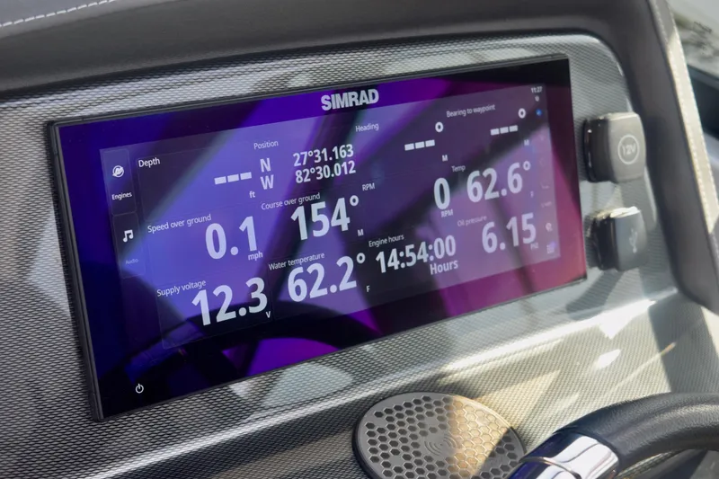 Slide: The Image of Dashboard of 2025 Monterey 275SS Super Sport boat with digital display and controls. - 77