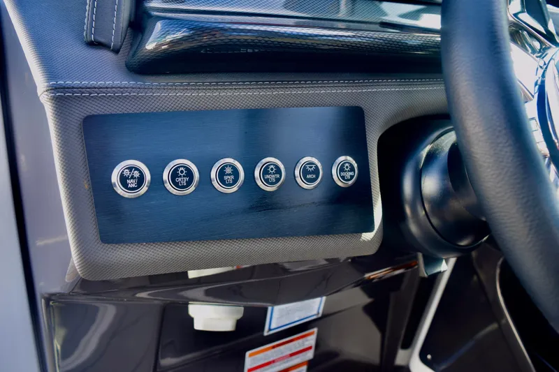 Slide: The Image of Dashboard controls of 2025 Monterey 275SS Super Sport boat. - 81