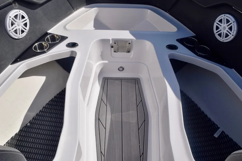 Slide: The Image of 2025 Monterey 275SS Super Sport boat interior with cup holders and speakers. - 87