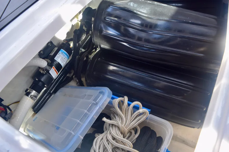 Slide: The Image of Storage compartment of 2025 Monterey 275SS Super Sport with ropes and equipment. - 91