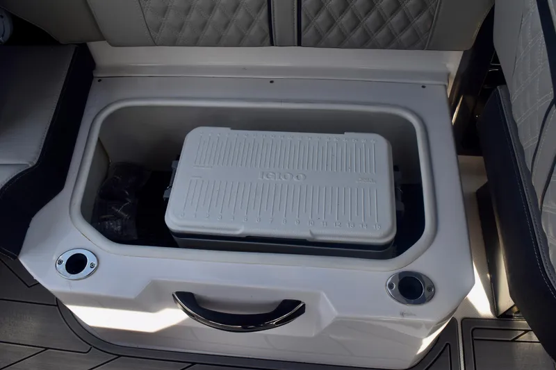Slide: The Image of Storage compartment with cooler in 2025 Monterey 275SS Super Sport boat. - 93