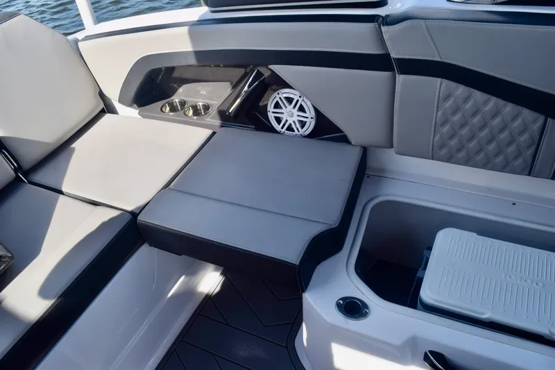 Slide: The Image of Interior of 2025 Monterey 275SS Super Sport boat with seating and storage. - 95