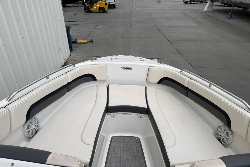 Slide: The Image of 2018 Chaparral Vortex 2430 VRX boat interior with white and black seating. - 13