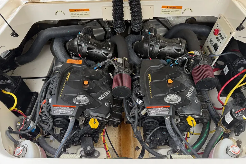 Slide: The Image of Twin Rotax engines in a 2018 Chaparral Vortex 2430 VRX boat. - 22
