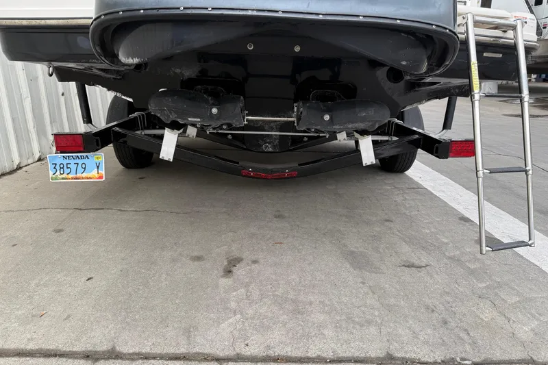 Slide: The Image of Rear view of 2018 Chaparral Vortex 2430 VRX boat with Nevada license plate and ladder. - 6