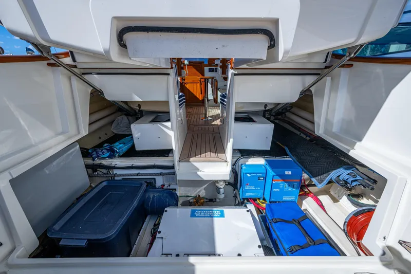 Slide: The Image of 2024 Hinckley 35 yacht storage area with equipment and supplies. - 49