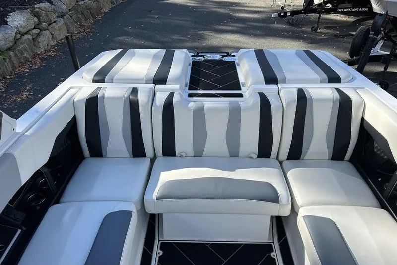 Slide: The Image of 2024 Malibu Wakesetter 22 LSV interior with sleek, modern seating design. - 10