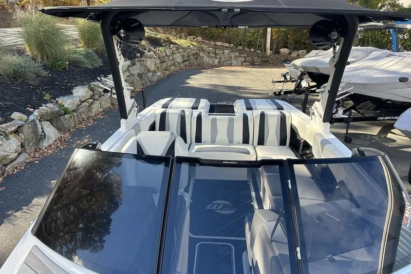 Slide: The Image of 2024 Malibu Wakesetter 22 LSV boat with sleek interior and modern design. - 7