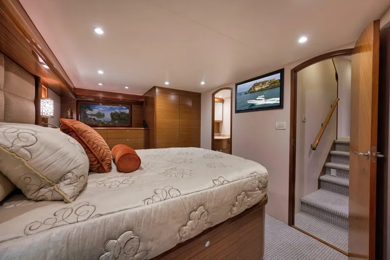 Slide: The Image of Luxurious Weaver custom yacht bedroom interior, 2012 model, with elegant decor and modern amenities. - 15
