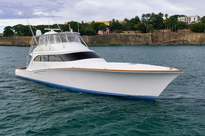 Slide: The Image of Luxury Weaver custom yacht from 2012 on scenic waterfront. - 3