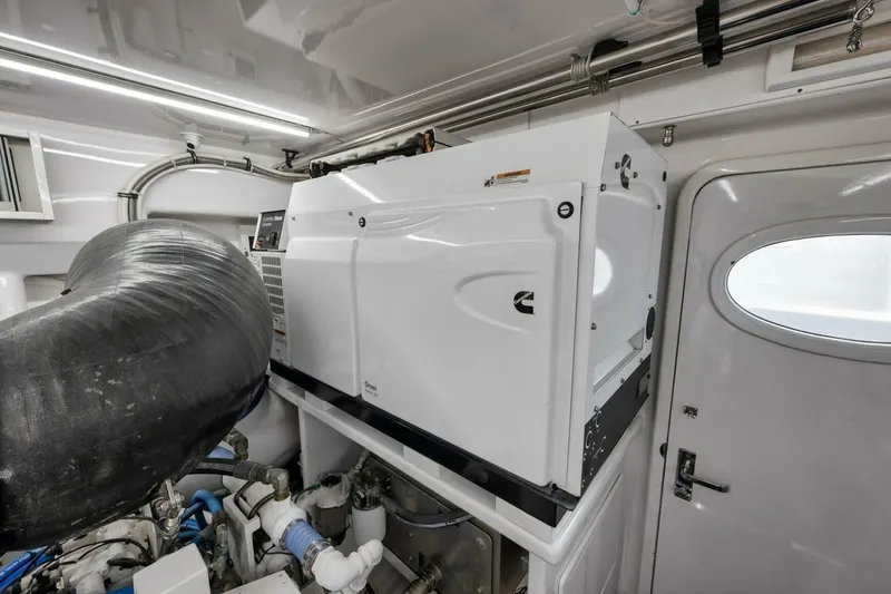 Slide: The Image of Weaver custom 2012 generator in a clean, organized engine room. - 47