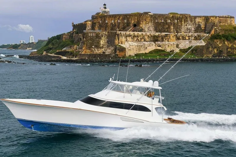 Slide: The Image of Luxury Weaver custom yacht cruising near historic coastal fortress, 2012 model. - 6