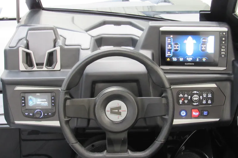 Slide: The Image of 2026 Axis A200 dashboard with steering wheel, touchscreen display, and control panel. - 10