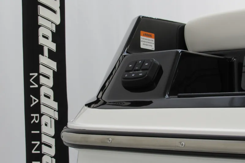Slide: The Image of 2026 Axis A200 boat dashboard with control panel, featuring sleek black and white design. - 14
